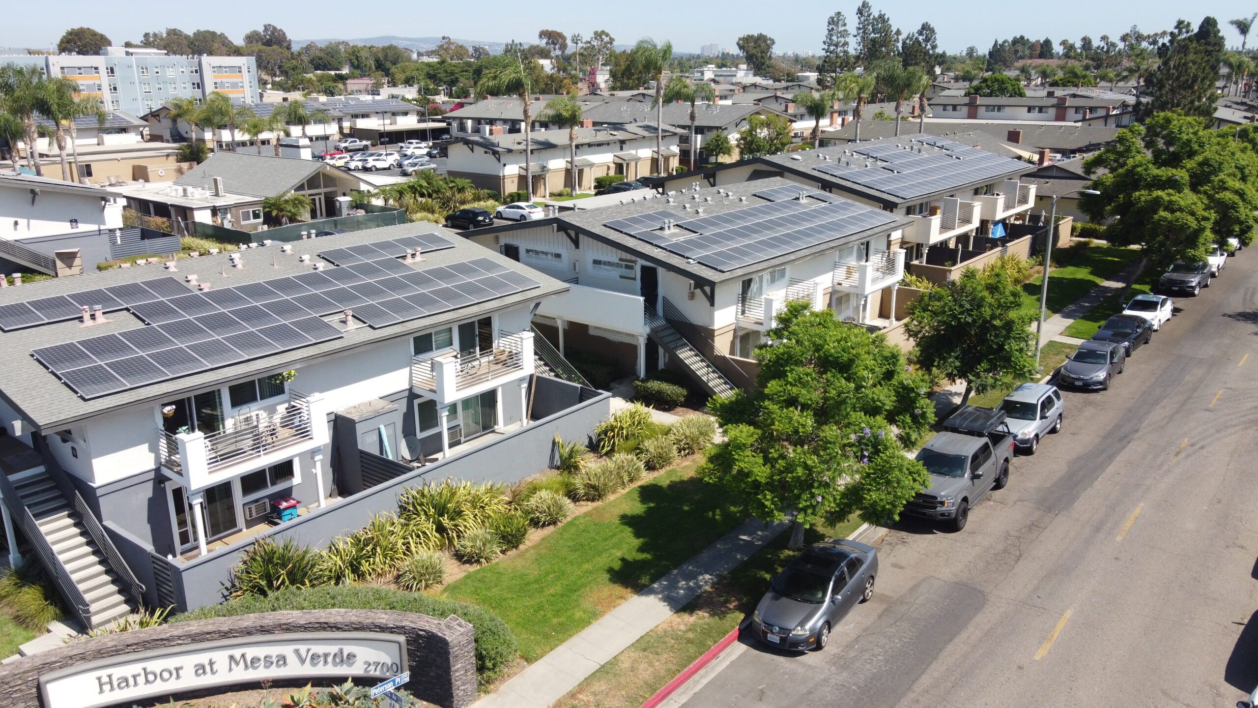 apartment buildings with commercial solar panels in orange county